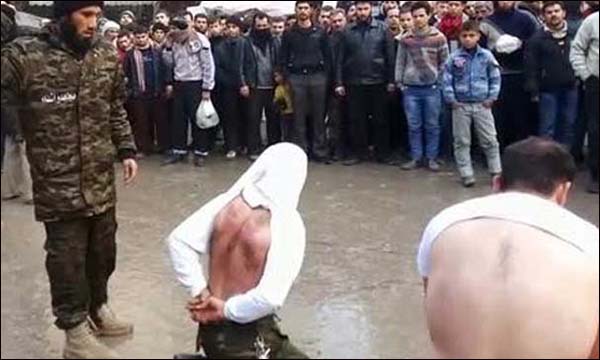 عناصر من داعش تجلد سوريين في الشارع العام