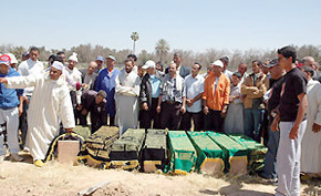 Inhumation des restes des huit enfants victimes