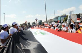 Opérations des forces de sécurité dans un quartier de Homs