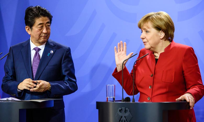  Merkel et Abe affichent des divergences avant le G7